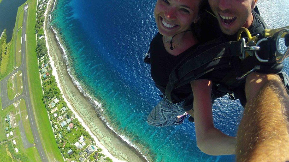 a little girl that is standing in the water