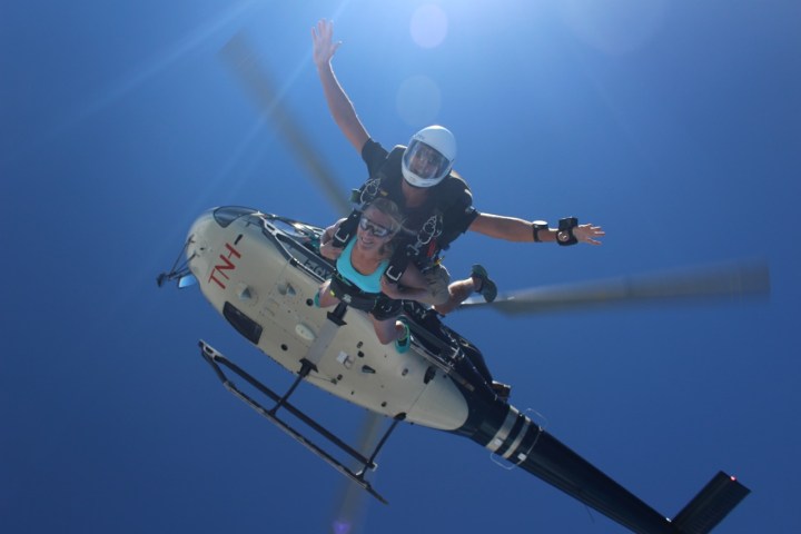 a helicopter high up in the air